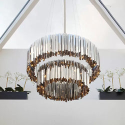 Modern Nordic luxury chandelier Celestial in premium stainless steel with golden, silver, or black finishes. The design, inspired by Northern skies, combines contemporary elegance with integrated LED lighting, creating a warm, inviting ambiance for living rooms or bedrooms.