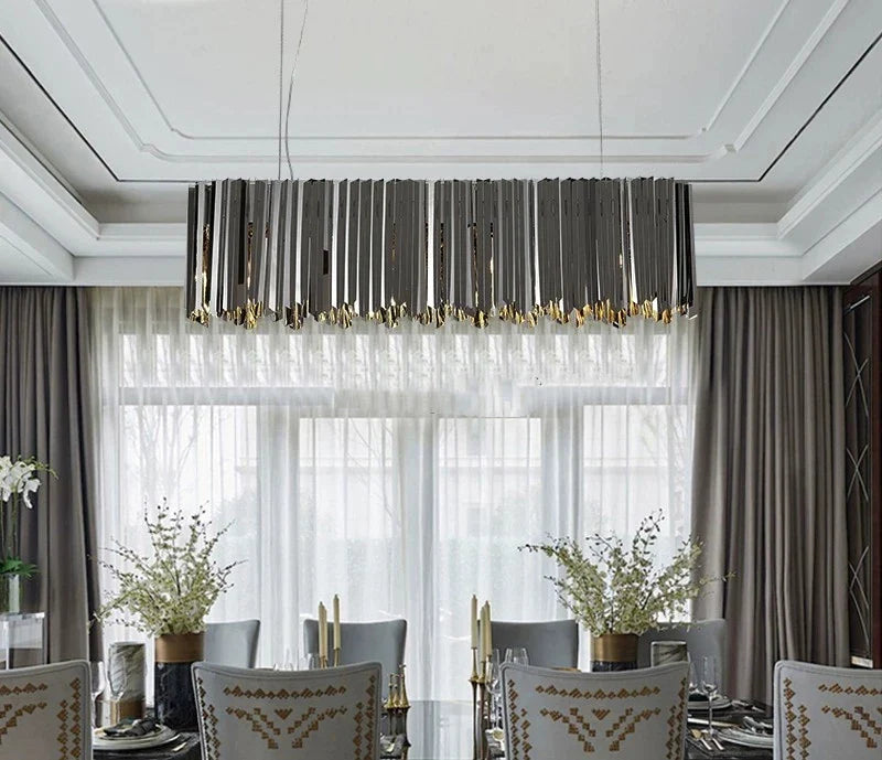 Modern Nordic luxury chandelier Celestial in premium stainless steel with golden, silver, or black finishes. The design, inspired by Northern skies, combines contemporary elegance with integrated LED lighting, creating a warm, inviting ambiance for living rooms or bedrooms.