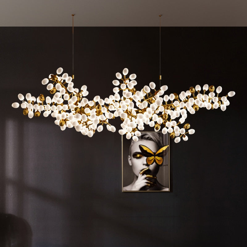 Luminate Living - Zygote High-quality white glass cluster chandelier. Organic-inspired design paired with luxury materials. Perfect for dining rooms, living areas, entrance halls, hotel areas, restaurants, etc.  White glass clusters with base frame in French gold color or Raw copper.