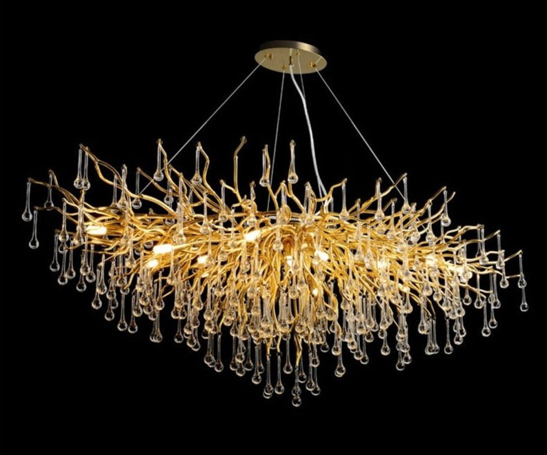 Luminate Living - ooze - "-What on earth is that majestic being hanging from the ceiling?"  Majestic crystal chandelier. Unique lighting for dining rooms, living areas, entrance halls, hotel areas, restaurants, etc.    K9 crystals with silver/gold metal plated aluminum frame. - A work of art.  2 sizes - 2 colors L120cm: L120xW50xH35cm, 12-25m2 L160cm: L160xW55xH35cm, 16kg, 15-30m2