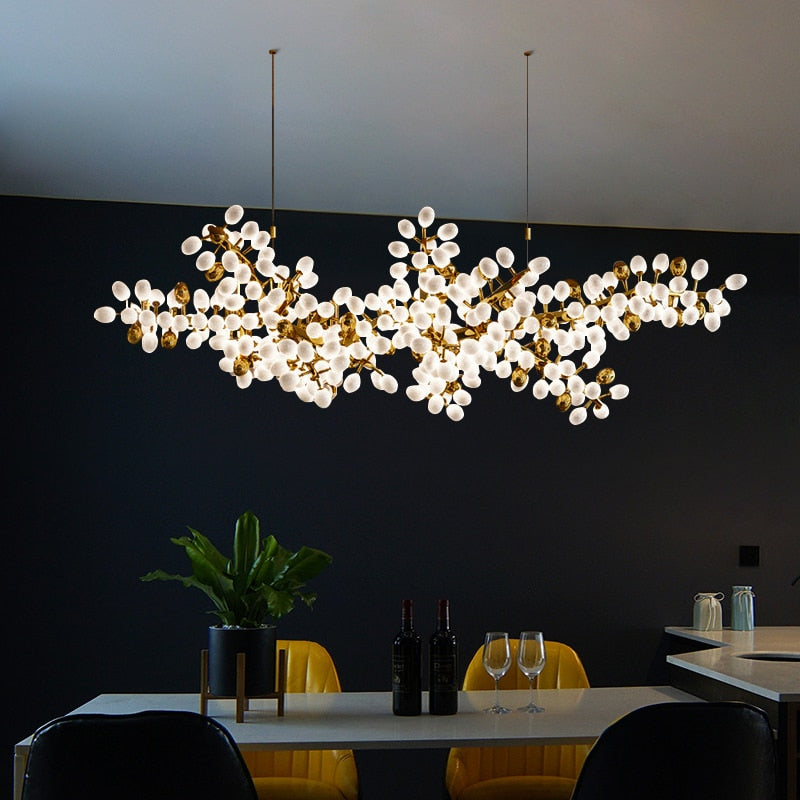 Luminate Living - Zygote High-quality white glass cluster chandelier. Organic-inspired design paired with luxury materials. Perfect for dining rooms, living areas, entrance halls, hotel areas, restaurants, etc.  White glass clusters with base frame in French gold color or Raw copper.