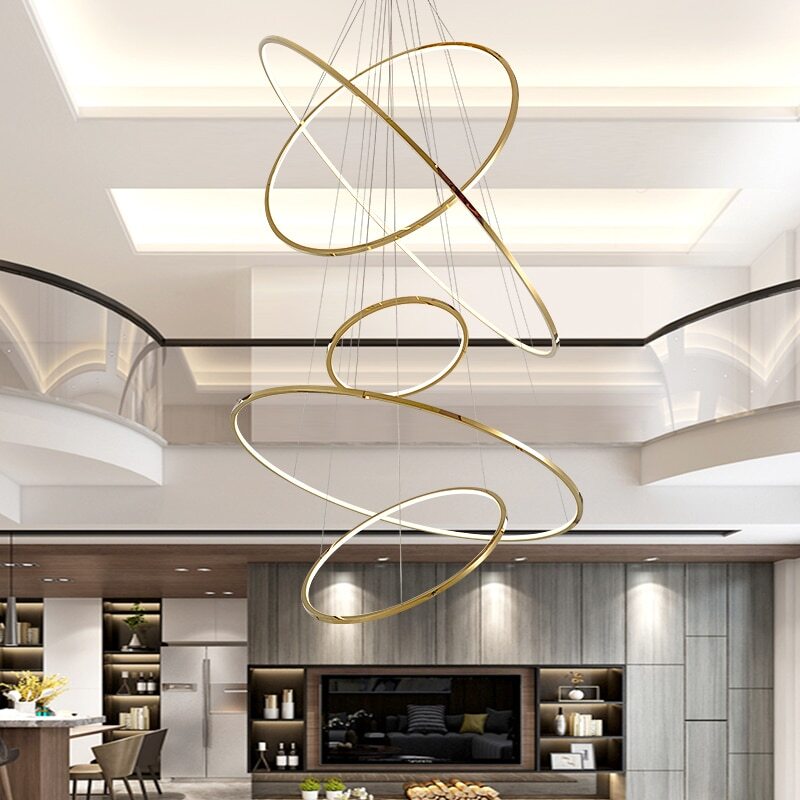 Lights of Scandinavia - Vienna - Simple yet elegant pendant light/chandelier. Modern minimalistic design, 1.5mm stainless steel with a vacuum plated gold surface and polymer silicone lampshade. Long-life LED chip. Adjustable hanging length. For high ceilings, we can customize suspension wires according to your request. Suitable for: Lobbies, bedrooms, living rooms, dining rooms, staircases, etc.